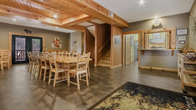 dining space with beamed ceiling, french doors, and wooden ceiling