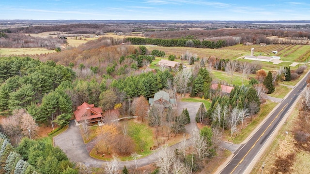 birds eye view of property featuring a rural view