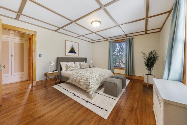 bedroom with wood-type flooring