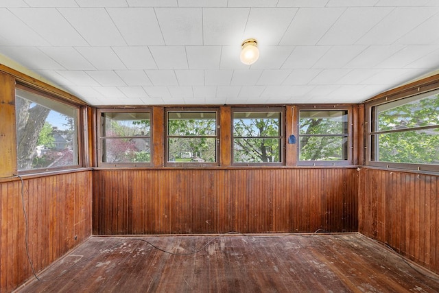 unfurnished sunroom featuring a wealth of natural light