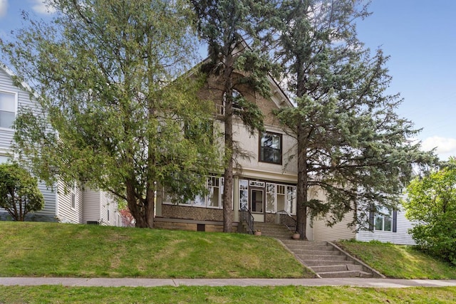 view of front of house with a front yard