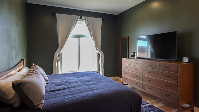 bedroom featuring hardwood / wood-style flooring