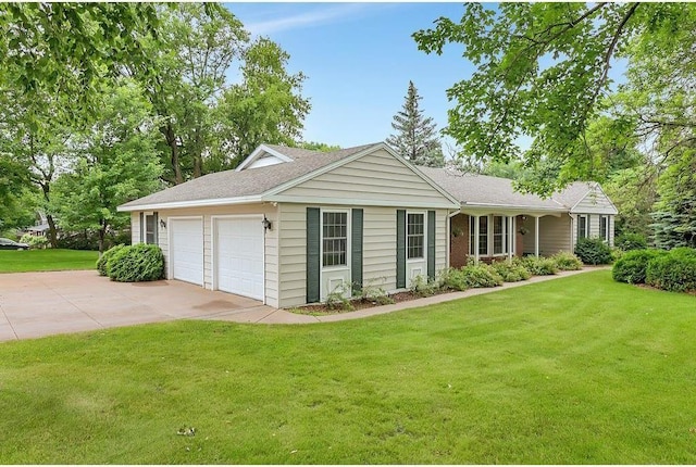 ranch-style house with a front yard and a garage