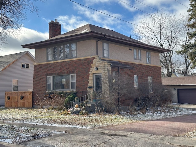 view of front of home with a garage