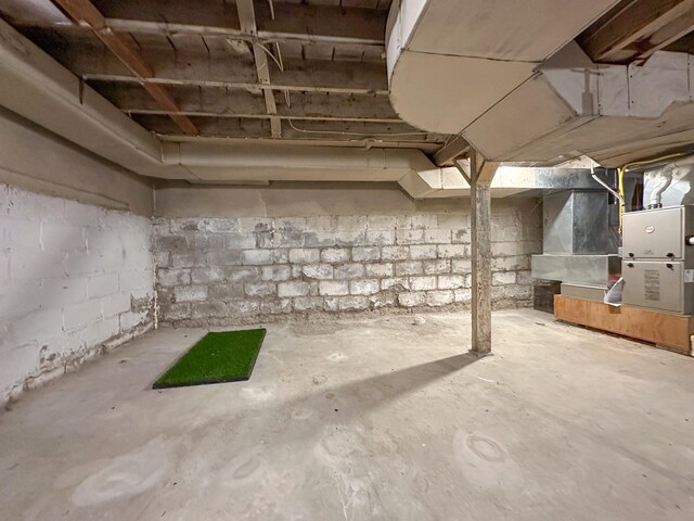 unfinished basement with heating unit