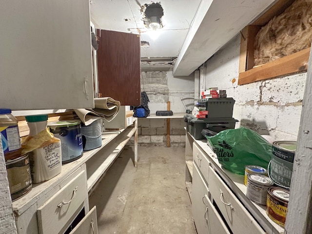 kitchen with concrete floors and light countertops