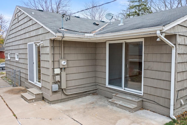 view of side of property featuring a patio