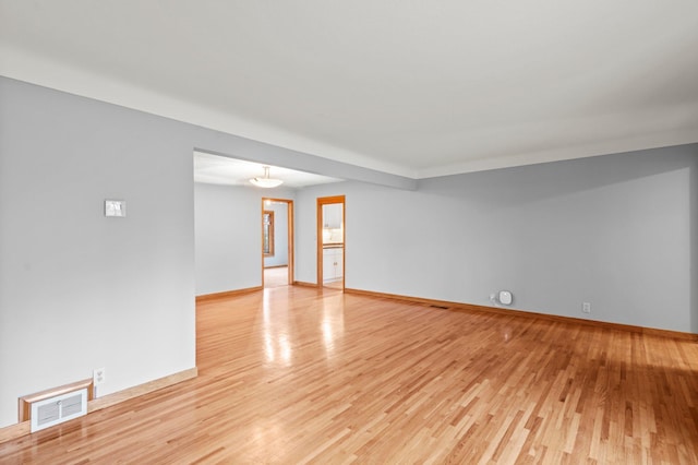 unfurnished room with light hardwood / wood-style floors