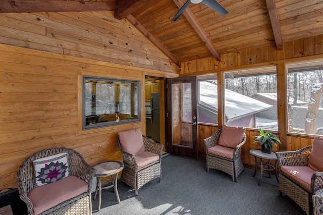 sunroom / solarium featuring wood ceiling, vaulted ceiling with beams, and ceiling fan