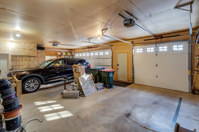 garage featuring a garage door opener