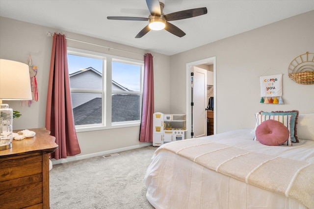 bedroom featuring ceiling fan and carpet floors