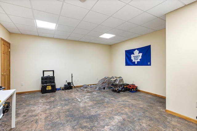 misc room featuring a paneled ceiling