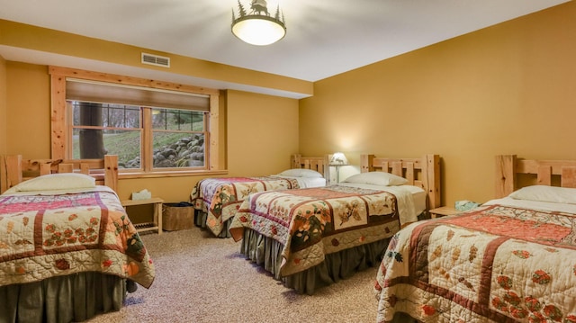 bedroom with carpet and visible vents