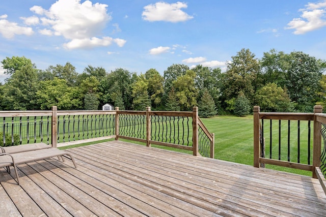 wooden terrace with a yard