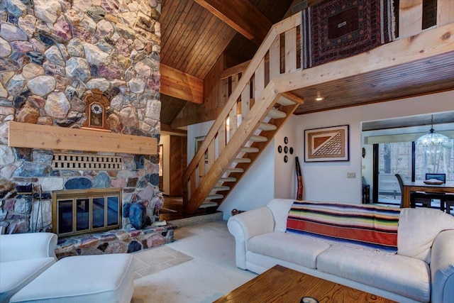 living room with a fireplace, beamed ceiling, high vaulted ceiling, and wooden ceiling