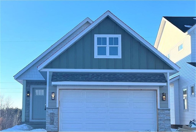 craftsman-style home with a garage