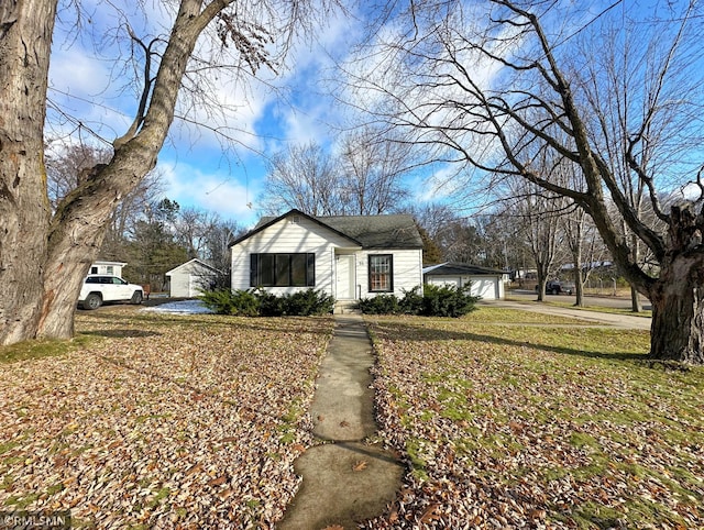 view of side of home with a lawn