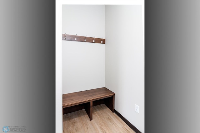 mudroom with light hardwood / wood-style floors