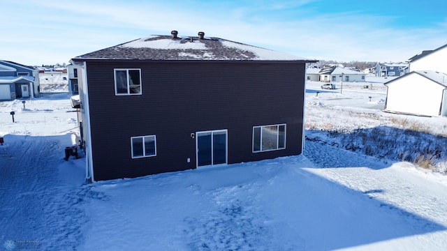 view of snow covered property