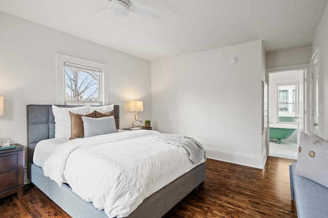 bedroom with ceiling fan and dark hardwood / wood-style floors