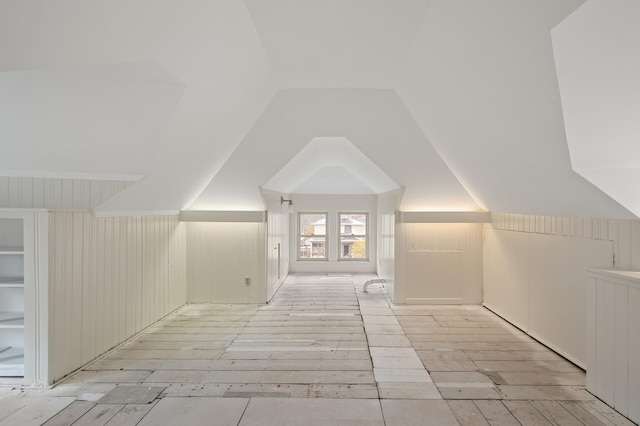 bonus room featuring lofted ceiling