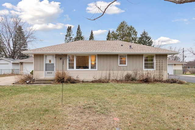 single story home featuring a front yard