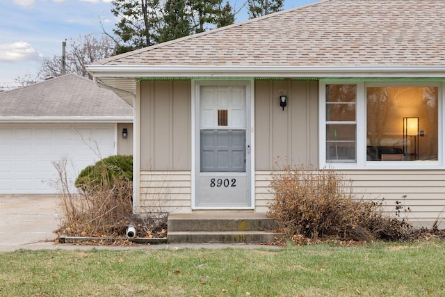 property entrance with a garage