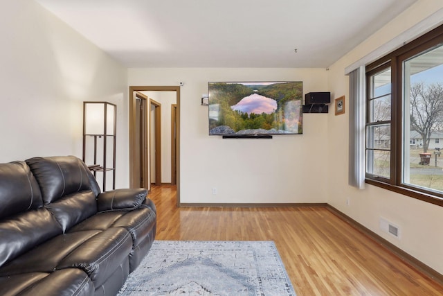 living room featuring light wood-type flooring