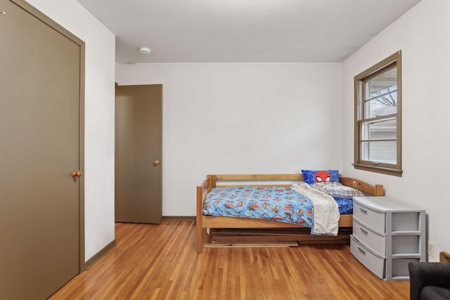 bedroom with light hardwood / wood-style floors