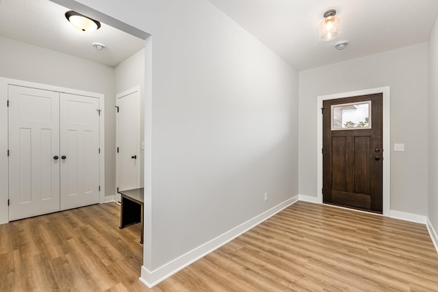 foyer entrance featuring light hardwood / wood-style floors