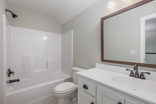 full bathroom featuring shower / bathtub combination, vanity, vaulted ceiling, and toilet