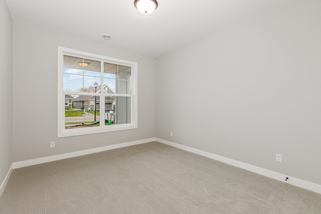 spare room with carpet flooring