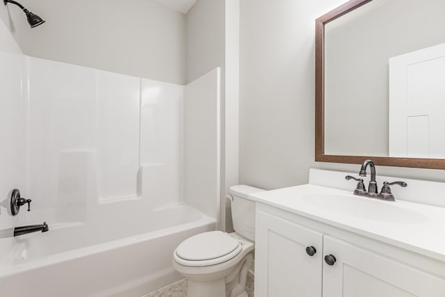 full bathroom featuring vanity, toilet, and washtub / shower combination