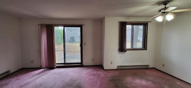 empty room with ceiling fan, a textured ceiling, and a baseboard heating unit