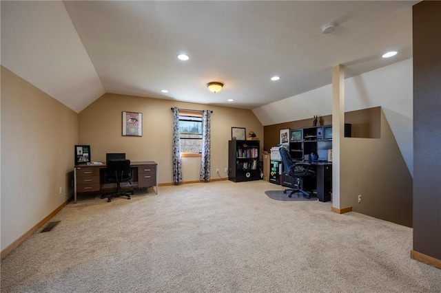 office area with light colored carpet and lofted ceiling