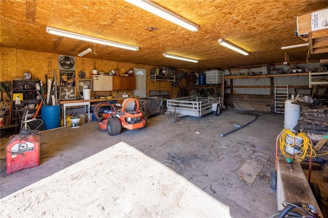 garage featuring a workshop area