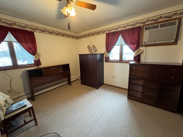 miscellaneous room featuring a wall unit AC, ceiling fan, light colored carpet, and a baseboard radiator