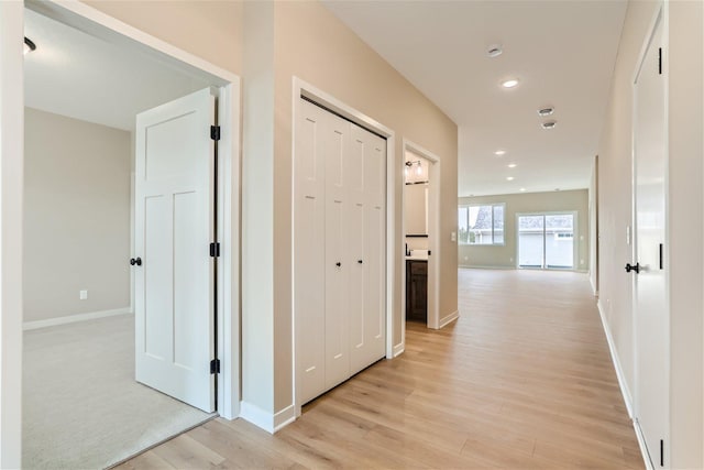 hallway featuring light hardwood / wood-style floors