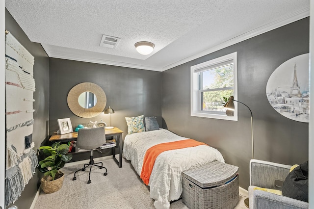 carpeted bedroom featuring a textured ceiling and ornamental molding