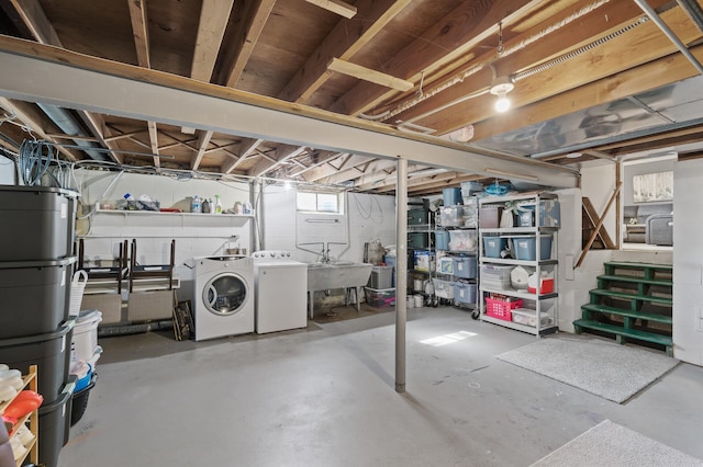 basement with independent washer and dryer and sink