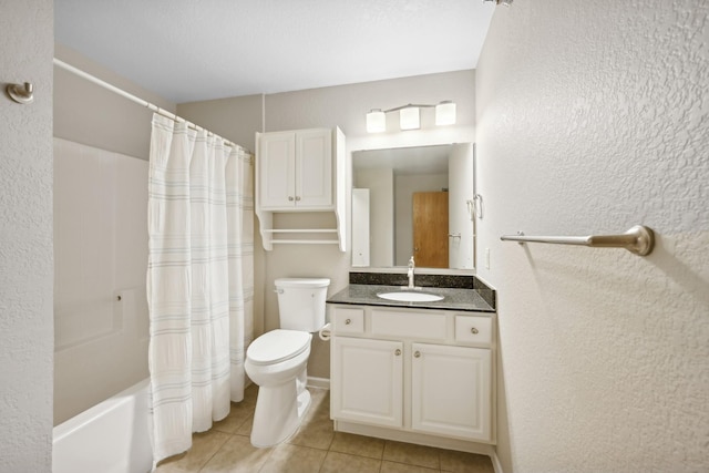 full bathroom featuring tile patterned flooring, vanity, toilet, and shower / tub combo with curtain