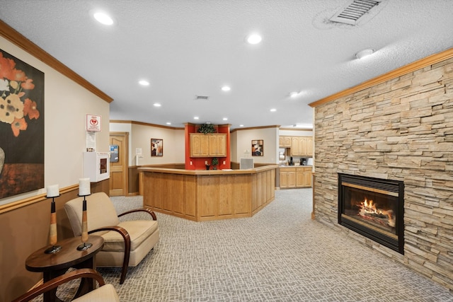 welcome area with a fireplace and indoor bar