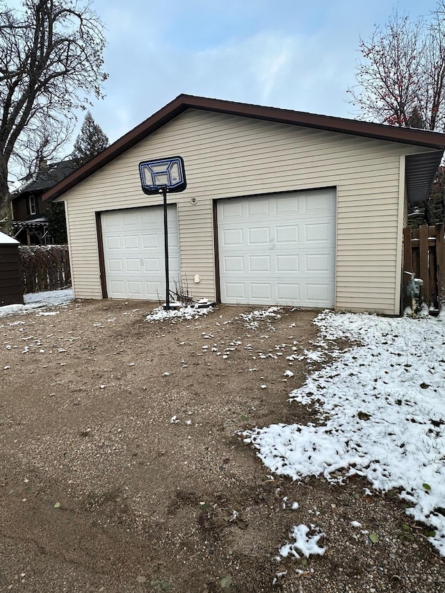 view of snow covered garage