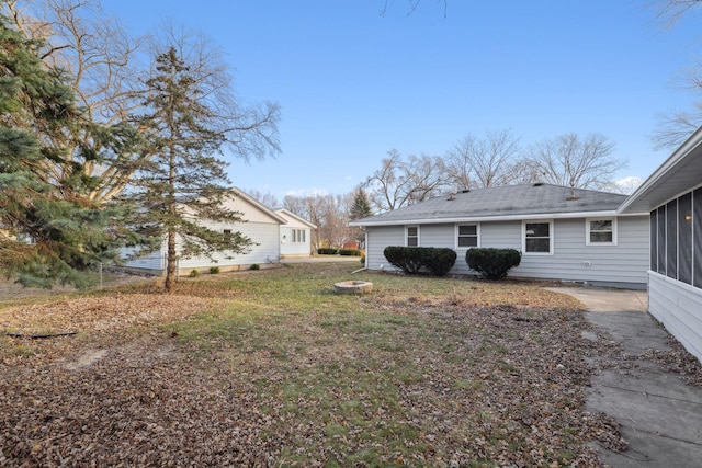 view of yard with a sunroom