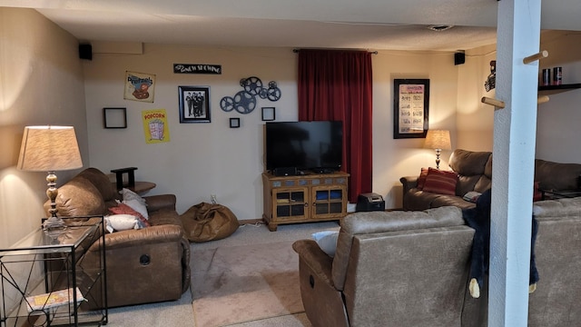 living room featuring light carpet