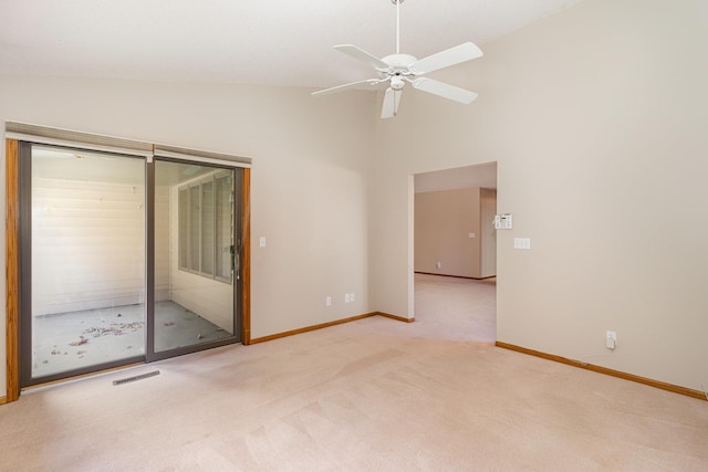 unfurnished room with light carpet, ceiling fan, and high vaulted ceiling