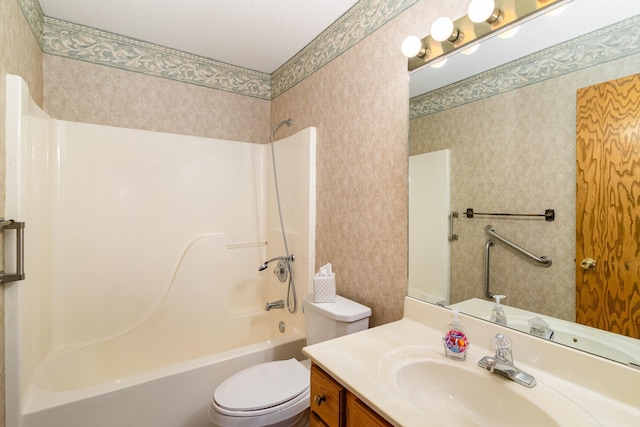 full bathroom featuring vanity,  shower combination, toilet, and a textured ceiling