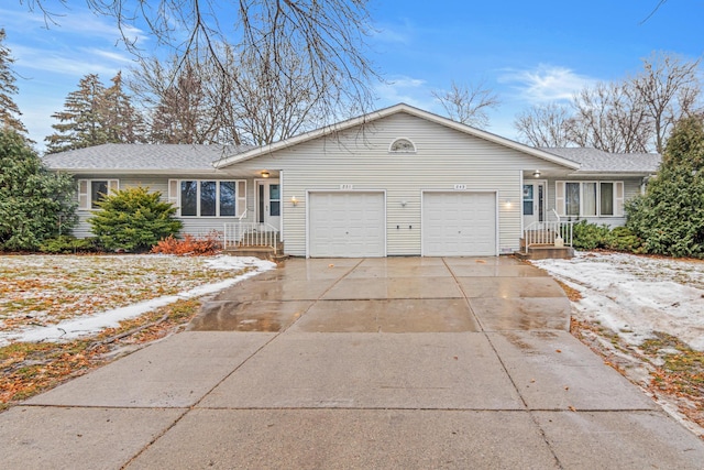 ranch-style home with a garage