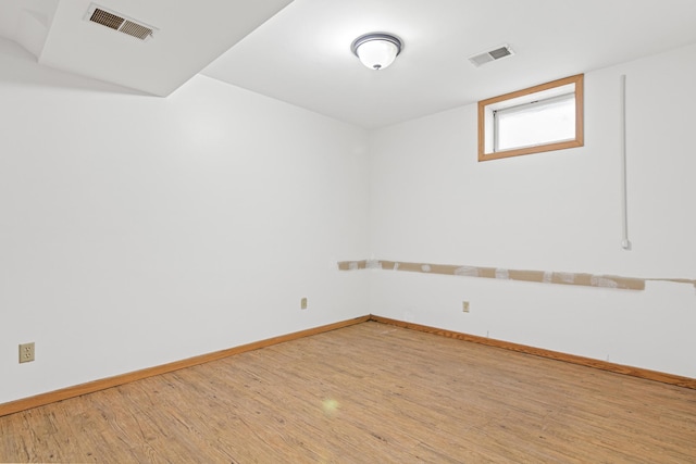 empty room featuring hardwood / wood-style floors