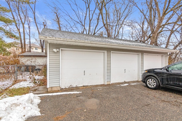 view of snow covered garage